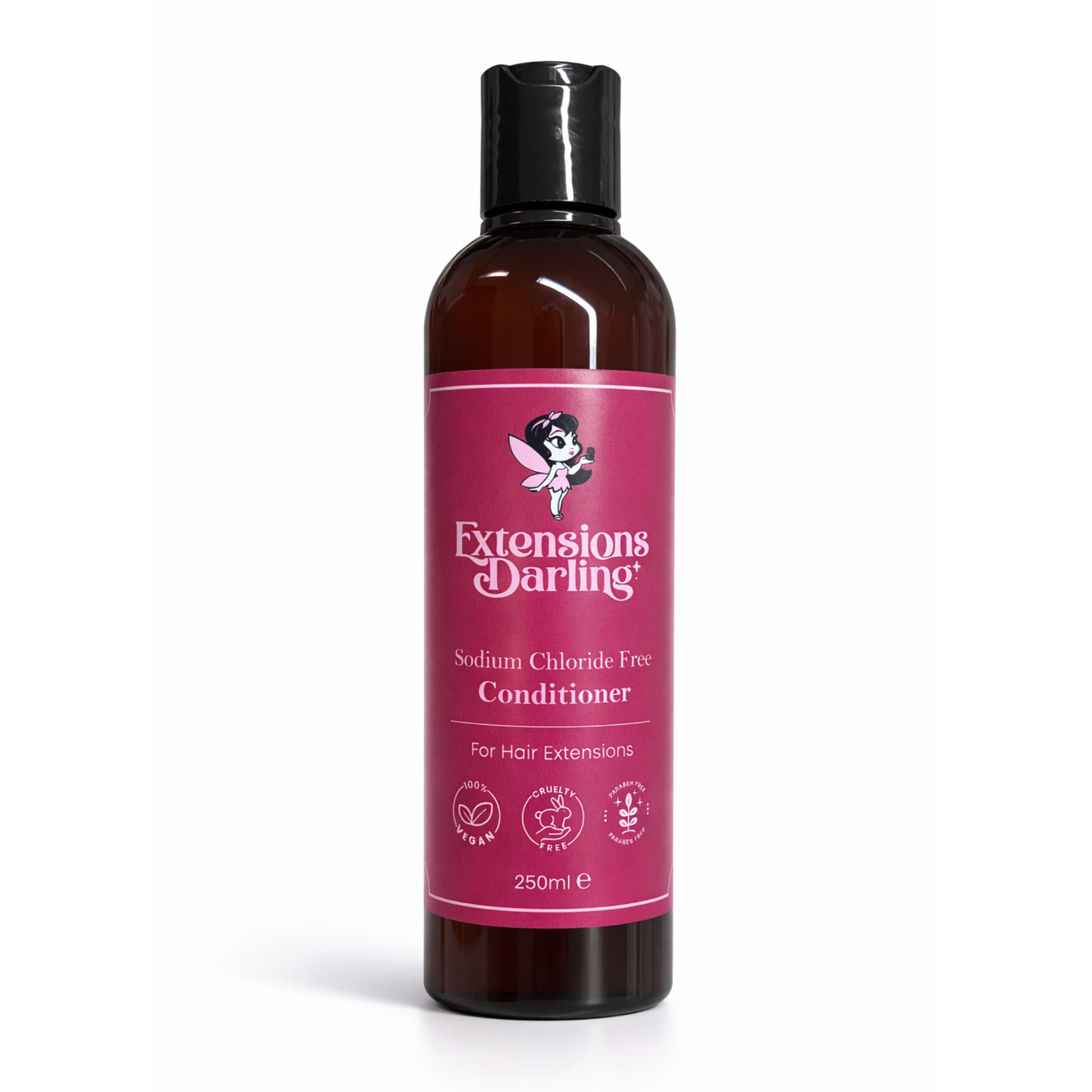 Bottle of 'Extensions Darling' conditioner with a pink label on a white background
